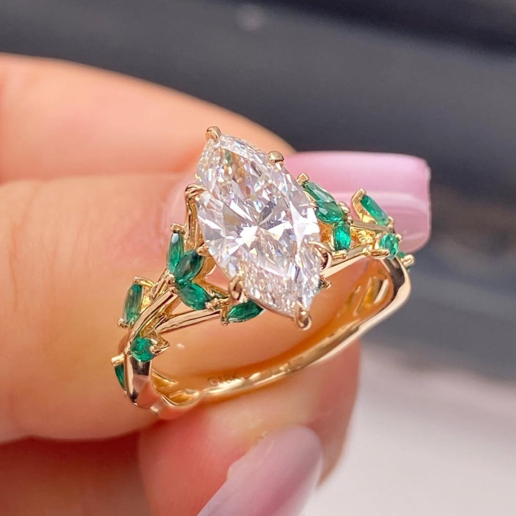 Marquise Cut Lab Grown Diamond Floral Engagement Ring with Emerald Accents in Solid Gold Nature Inspired Vintage Design