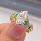 Marquise Cut Lab Grown Diamond Floral Engagement Ring with Emerald Accents in Solid Gold Nature Inspired Vintage Design