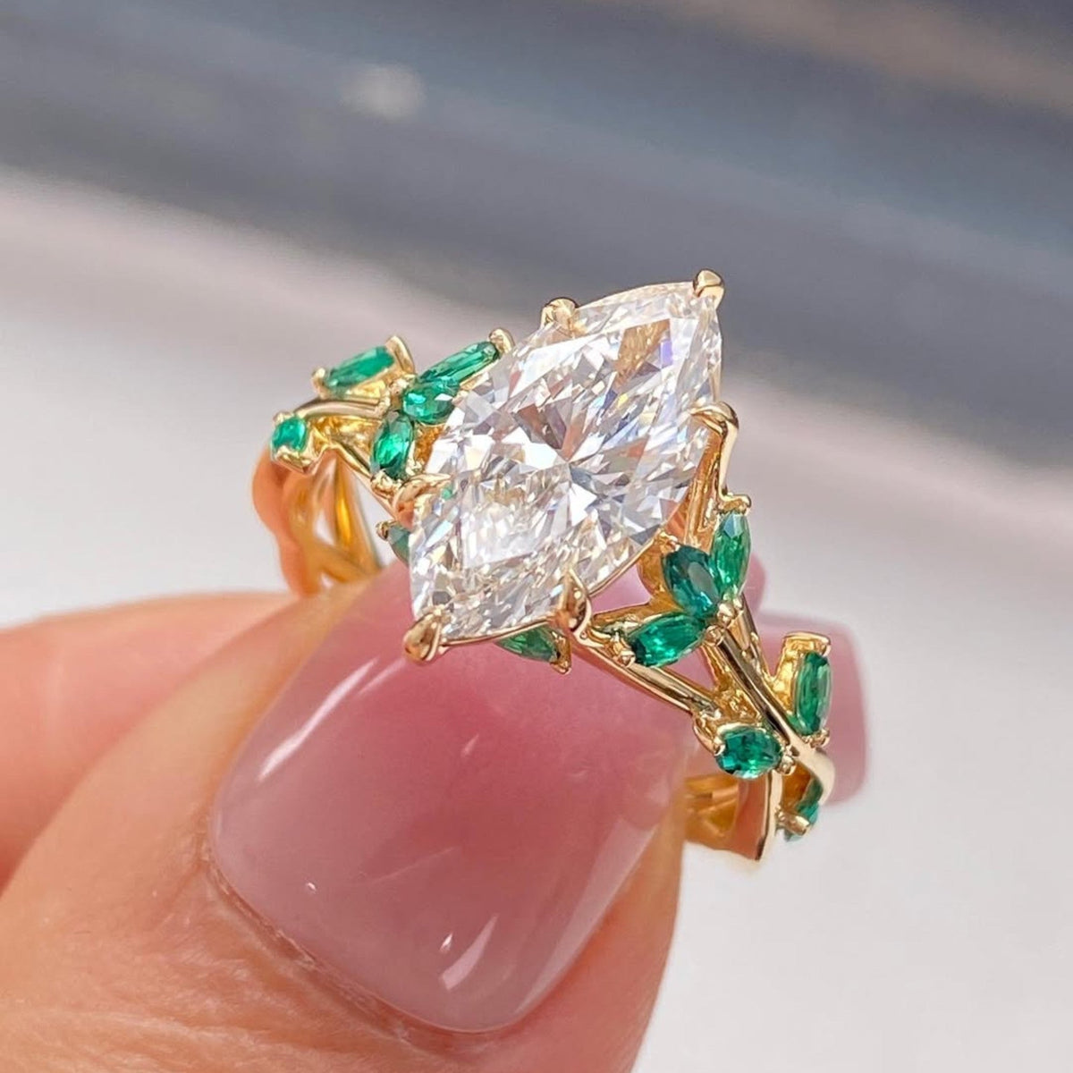 Marquise Cut Lab Grown Diamond Floral Engagement Ring with Emerald Accents in Solid Gold Nature Inspired Vintage Design