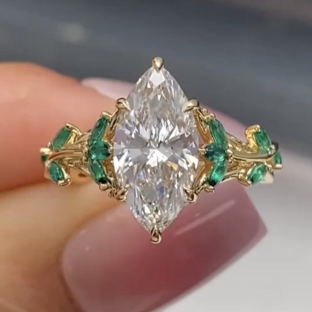 Marquise Cut Moissanite Diamond Floral Engagement Ring with Emerald Accents in Solid Gold Nature Inspired Vintage Design