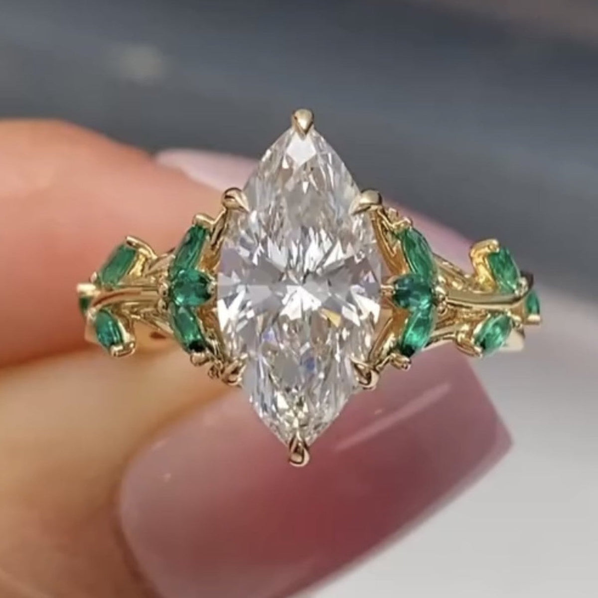 Marquise Cut Lab Grown Diamond Floral Engagement Ring with Emerald Accents in Solid Gold Nature Inspired Vintage Design