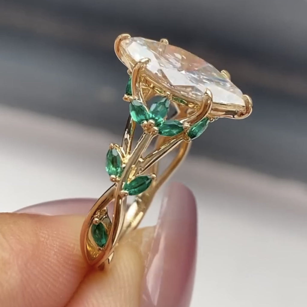 Marquise Cut Moissanite Diamond Floral Engagement Ring with Emerald Accents in Solid Gold Nature Inspired Vintage Design