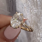 Oval Cut Lab Grown Diamond Engagement Ring with Twisted Pave Band