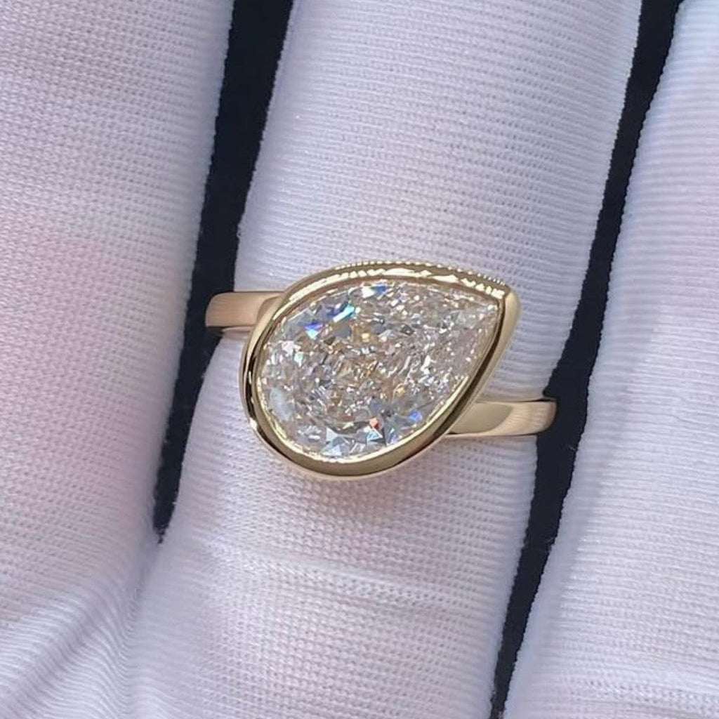 Bezel Set Pear Moissanite Engagement Ring East West Wedding Ring