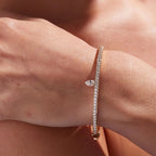 Rose gold bracelet with diamonds on a wrist