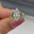 Marquise Cut Moissanite Diamond Floral Engagement Ring with Emerald Accents in Solid Gold Nature Inspired Vintage Design